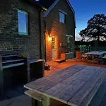 Feriehus The Coach House 1861